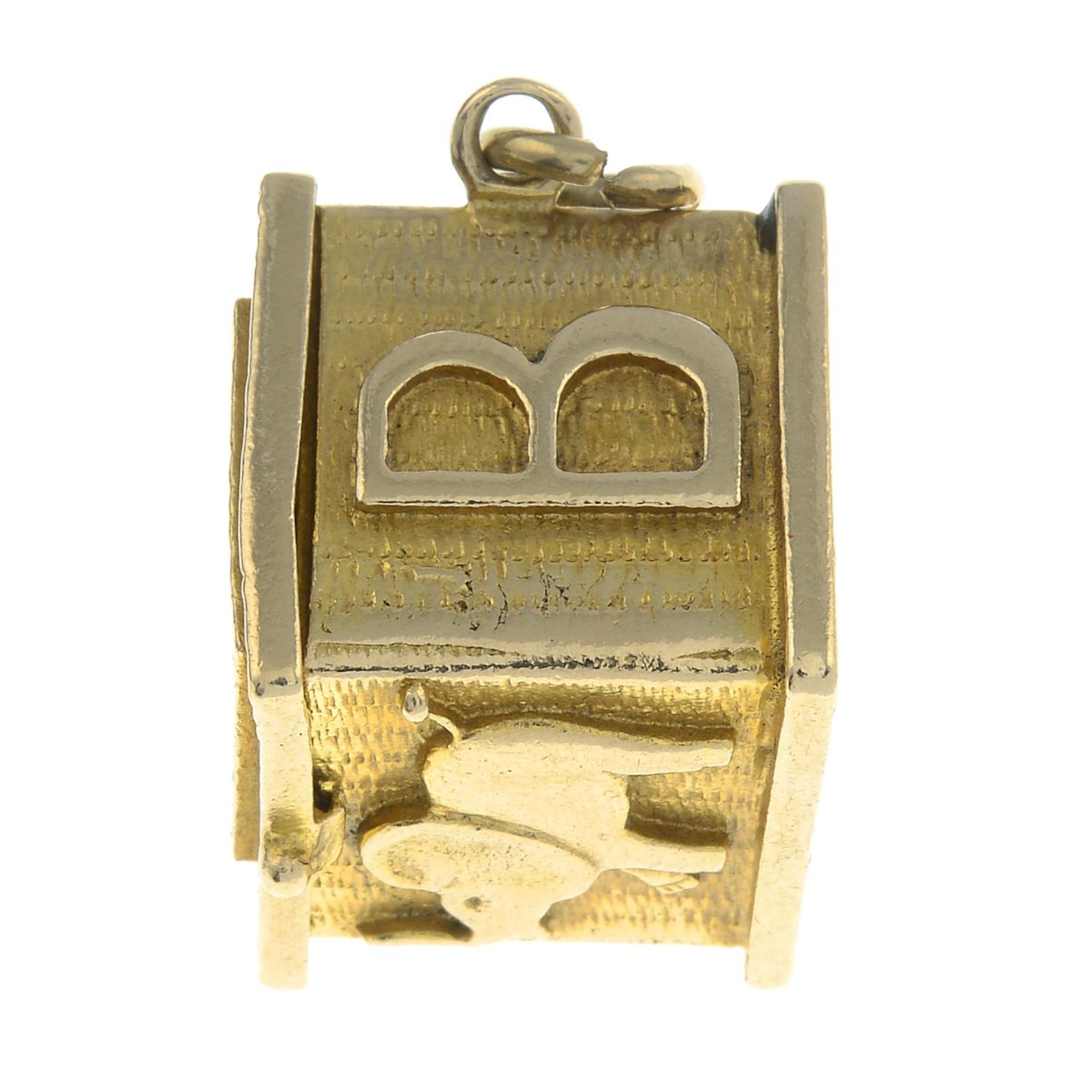 A 9ct gold Jack-in-the-box charm, - Bild 2 aus 3