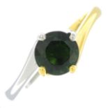 An 18ct bi-colour gold green tourmaline single-stone ring.Import marks for 18ct gold.