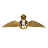 An early 20th century 15ct gold Royal Air Force enamel badge.Stamped 15ct.Length 5.2cms.