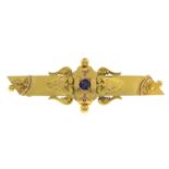 A late Victorian 9ct gold blue gem brooch.Two gems deficient.