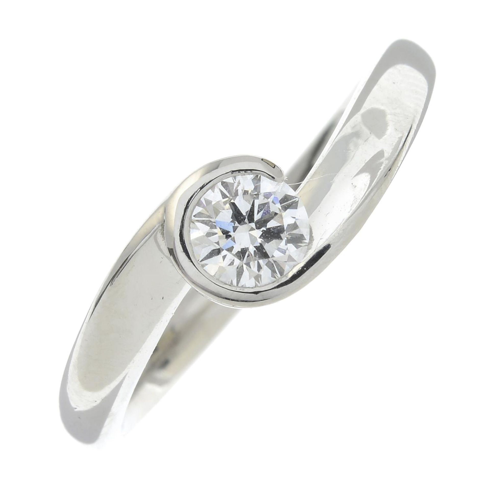 A platinum diamond single-stone ring.