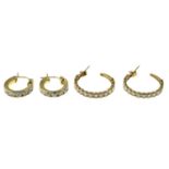 Two pairs of 9ct gold cubic zirconia hoop earrings.Hallmarks for 9ct gold.