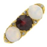 An opal and garnet three-stone ring.Ring size S.