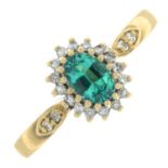 A 9ct gold synthetic emerald and diamond cluster ring.Estimated total diamond weight 0.15ct.