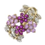 A 9ct gold pink sapphire, ruby and diamond floral dress ring.Hallmarks for 9ct gold.