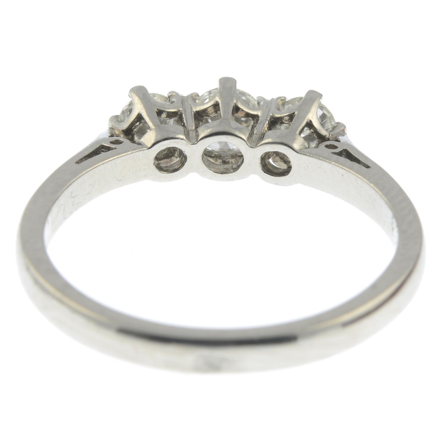 A platinum diamond three-stone ring.Total diamond weight 0.65ct, - Image 2 of 2