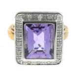 A 9ct gold amethyst and diamond cluster ring.Total diamond weight 0.10ct,