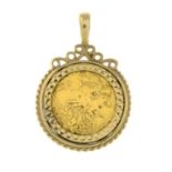 A 9ct gold half sovereign pendant.Sovereign dated 1982.