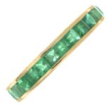 An emerald full eternity ring.Stamped 585.