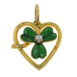An early 20th century 18ct gold diamond and green enamel shamrock pendant.Stamped 18.