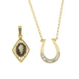 9ct gold smoky quartz pendant, hallmarks for 9ct gold, length 2.4cms, 1gm.