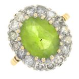 A 9ct gold peridot and diamond cluster ring.Peridot calculated weight 4cts,