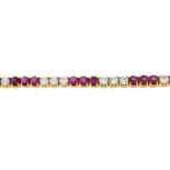 A ruby and colourless cubic zirconia bracelet.Total ruby weight 5.51cts,