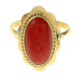 A coral cabochon single-stone ring.Stamped 585.Ring size O.