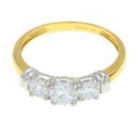 An 18ct gold cubic zirconia three-stone ring.Hallmarks for Birmingham, 2005.Ring size O1/2.