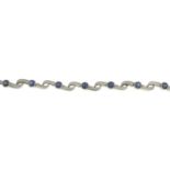 A 9ct gold sapphire bracelet.Hallmarks for 9ct gold.