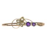 An Edwardian 9ct gold amethyst and split pearl foliate brooch.Hallmarks for Chester,