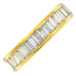 A baguette-cut diamond full eternity ring.Estimated total diamond 3 to 3.50cts.