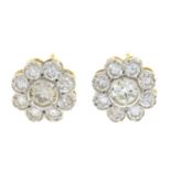 A pair of brilliant-cut diamond cluster stud earrings.Estimated total diamond weight 0.75ct,