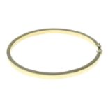 A 9ct gold polished bangle.Hallmarks for 9ct gold.