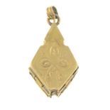 An early 20th century locket, unfurling to reveal star, with oval-shape vacant panels.Length 4cms.