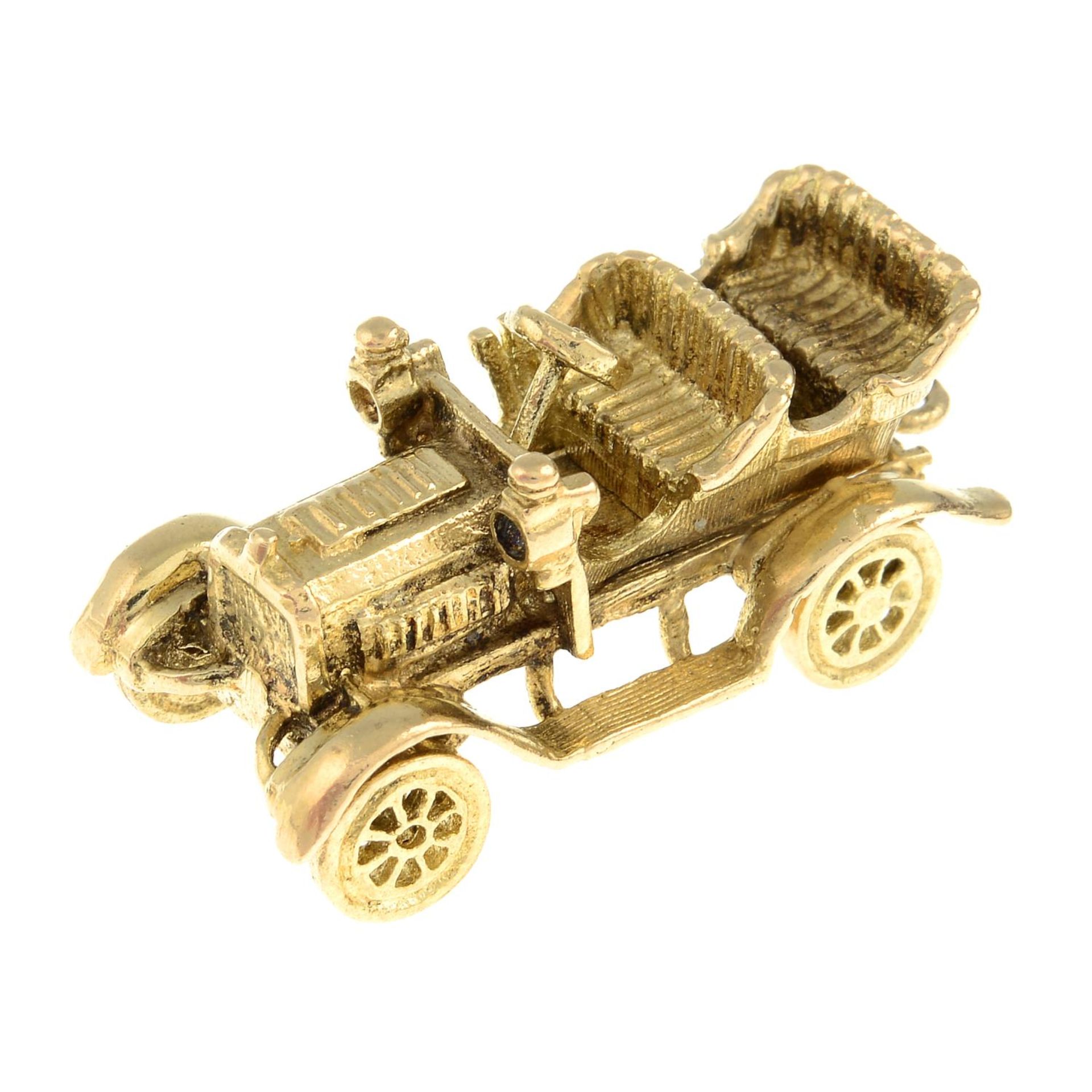 A 9ct gold vintage car charm.Hallmarks for London, 1970.Length 3.2cms.