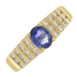 A sapphire and diamond ring.Estimated total diamond weight 0.25ct.