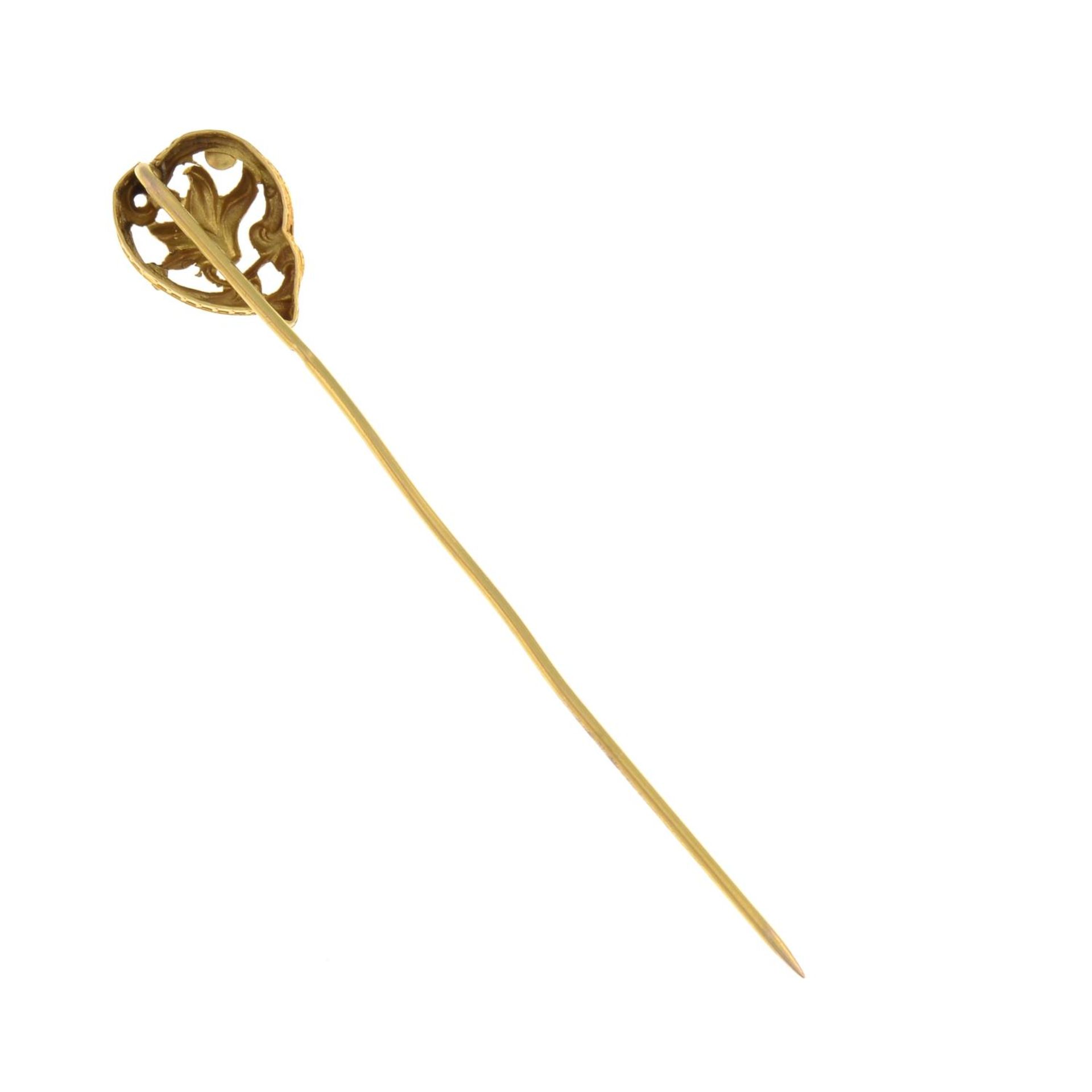 An early 20th century gold foliate stickpin.French assay marks.Length of stickpin head 1.3cms. - Image 2 of 2