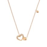 A diamond heart necklace.Total diamond weight 0.02ct, stamped to mount.