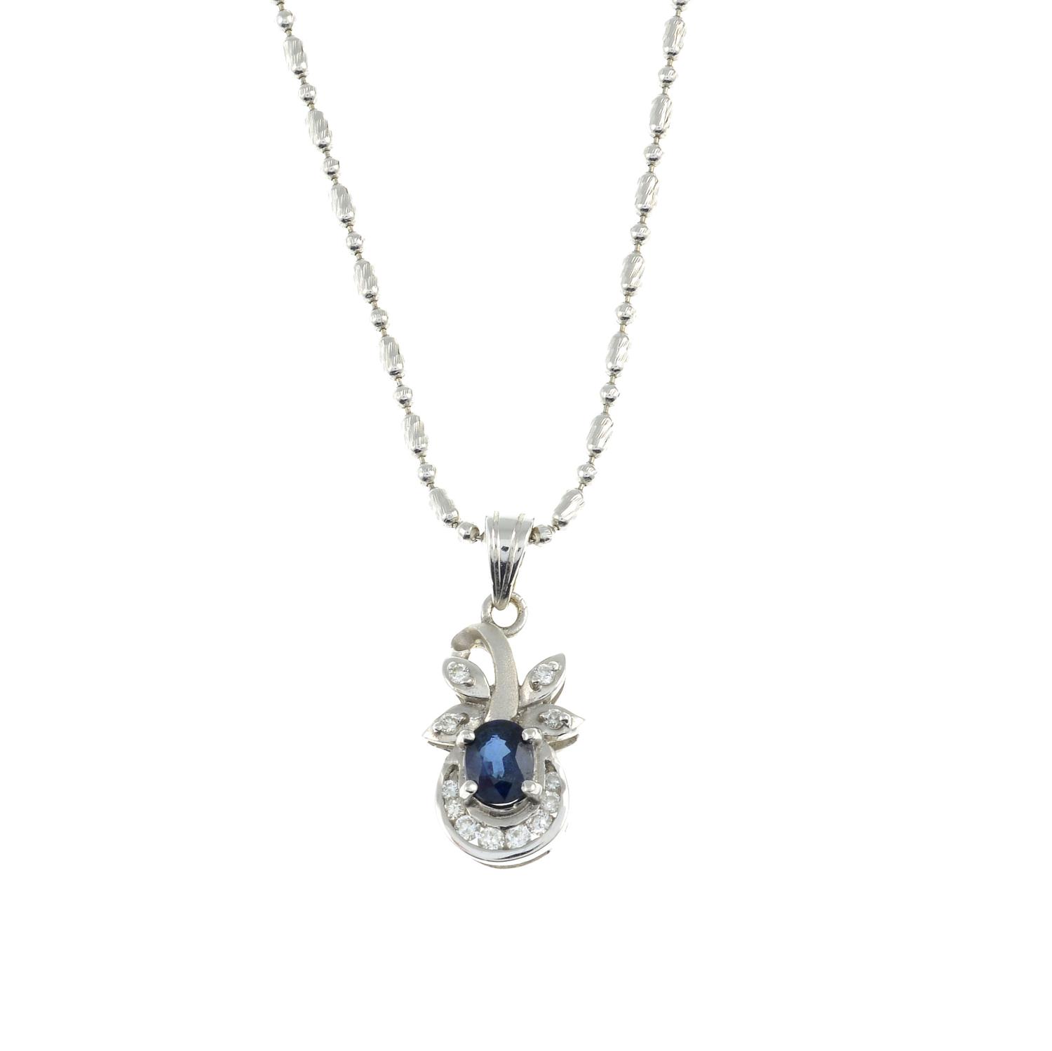 A sapphire and diamond pendant,