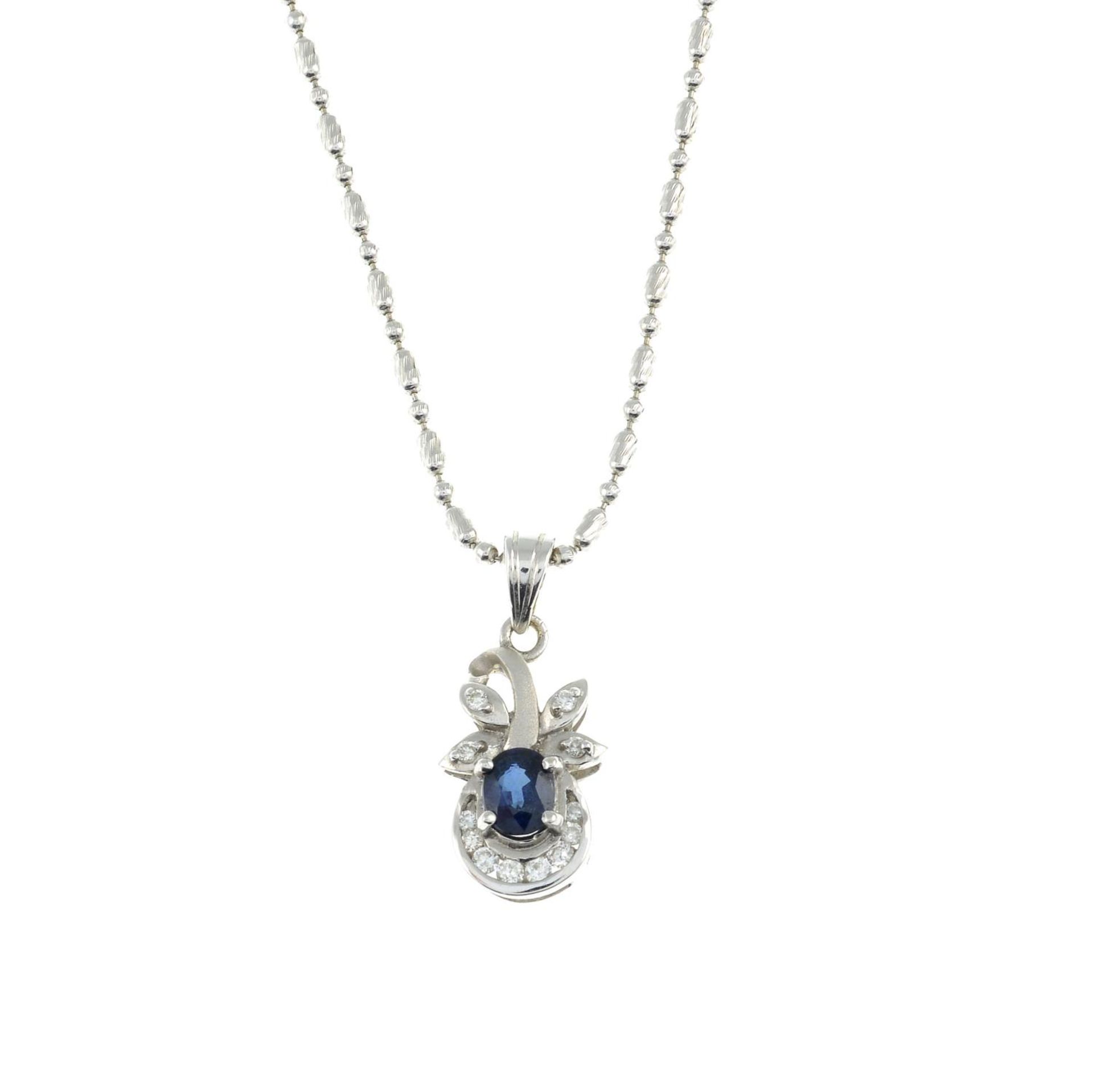 A sapphire and diamond pendant,