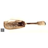 A William IV hallmarked silver fiddle pattern fish slice with pierced acorn and oak leaf