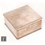 A hallmarked silver Arts & Crafts square sectioned planished box of plain form, 9.5cm, London