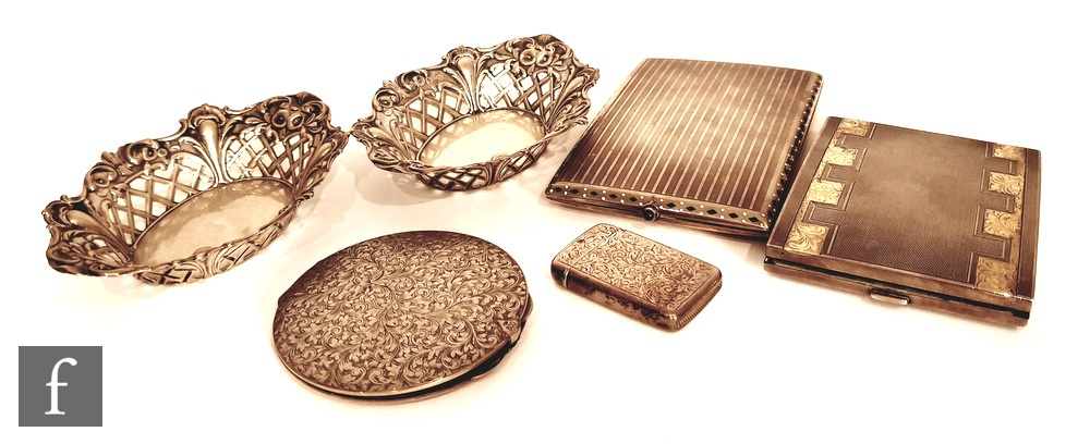 A small parcel lot of continental silver items to include two cigarette cases, one with enamelled