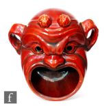 Unknown - A late 19th to early 20th Century grotesque ruby lustre spoon warmer modelled as an impish