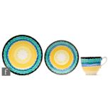 Grays Pottery - A 1930s Art Deco trio decorated with radial bands of black, green, blue and