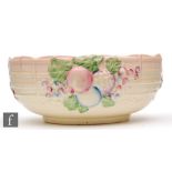 Clarice Cliff - Fruit Basket - A shape 883 fruit bowl relief moulded with fruit over a basket