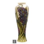 Kerry Goodwin - Moorcroft Pottery - A vase of slender form decorated in the Florian Hyacinth