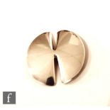 Nanna Ditzel - Georg Jensen - A Danish Sterling silver brooch of abstract circular section with