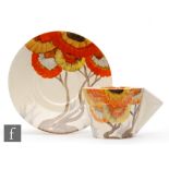 Clarice Cliff - Rhodanthe - A Conical shape coffee cup and saucer circa 1934, hand painted to cup