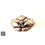 Georg Jensen - A post war hallmarked silver brooch in the Arts and Crafts style, formed as