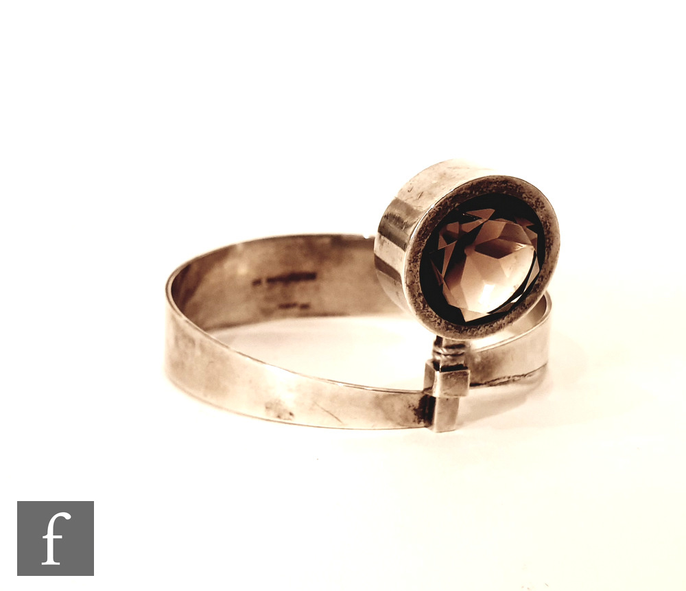 Kupittaan Kulta - A Finnish Sterling silver modernist bangle inset with a smoky quartz in a circular