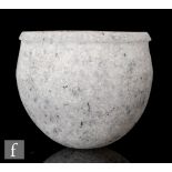 Margaret Alston - A small pate de verre ovoid bowl with flared rim in tonal white and pale pink with