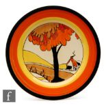 Clarice Cliff - House & Bridge - A circular plate circa 1932, hand painted with a stylised tree,