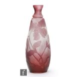 Galle - An early 20th Century cameo glass vase of ovoid form with waisted collar neck in amethyst
