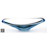 Geoffrey Baxter - Whitefriars - An elongated bowl, model 9573 in arctic blue with a cased blue