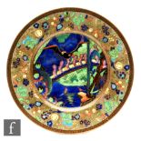 Daisy Makeig Jones - Wedgwood - A 1920s Fairyland lustre Lincoln plate decorated in the Roc Centre