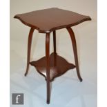 Unknown - An Art Nouveau mahogany occasional table of square