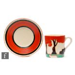 Clarice Cliff - Red Autumn - A Tankard shape coffee can and saucer circa 1930, hand painted with a