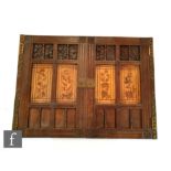 John Henry Chamberlain (1831-1883) - A pair of carved oak and marquetry inlaid fielded panel cabinet